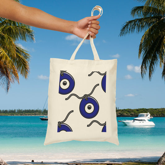 White canvas tote bag with blue evil eye pattern design from Blue Eye 3