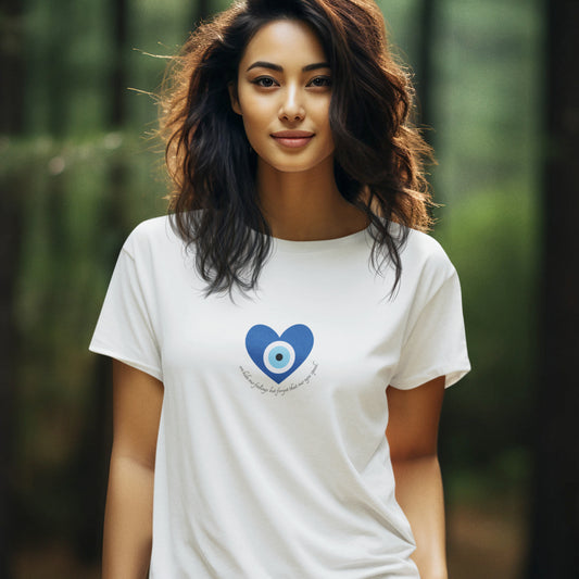 White women’s tee featuring blue heart and evil eye design from Eyes Speak collection